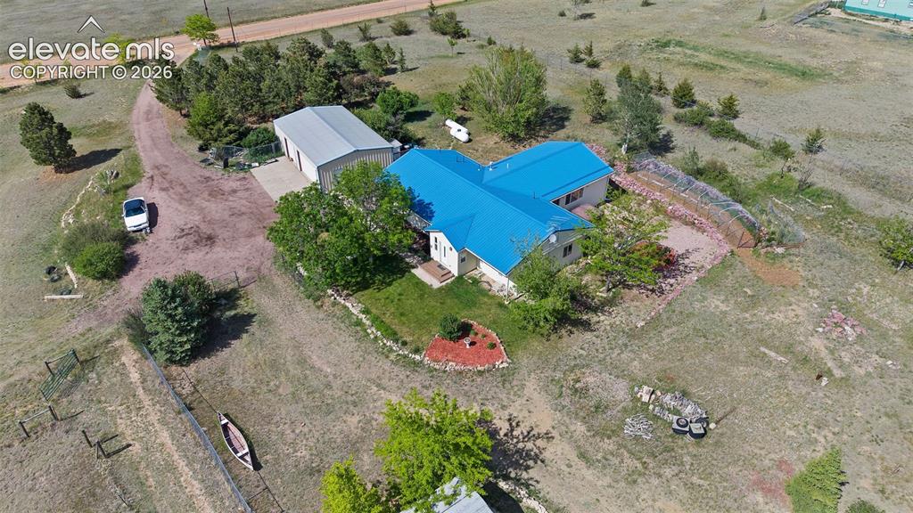 Image 39 of 40: Aerial view showing main house and 4 car garage.