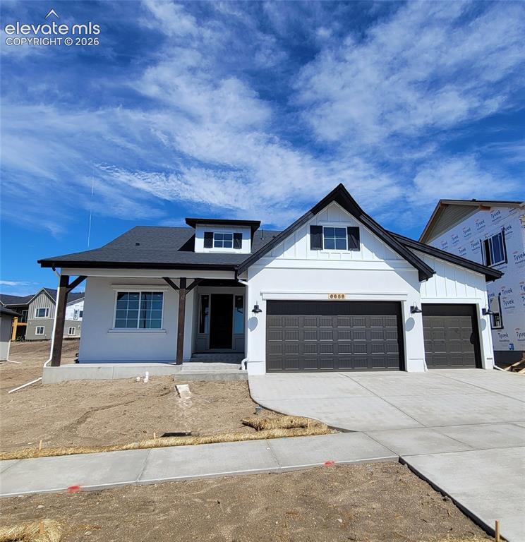 Caption: Brentford-Ranch Plan-Farmhouse Elevation-3 Car Garage-Finished Basement with 9