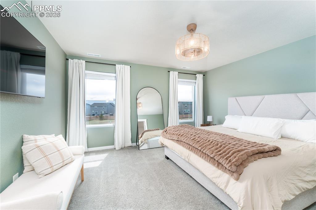 Image 13 of 38: upstairs primary suite