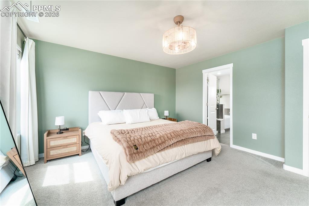 Image 14 of 38: upstairs primary suite