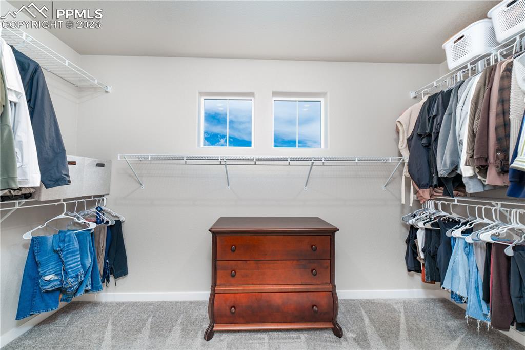 Image 17 of 38: primary walk in closet