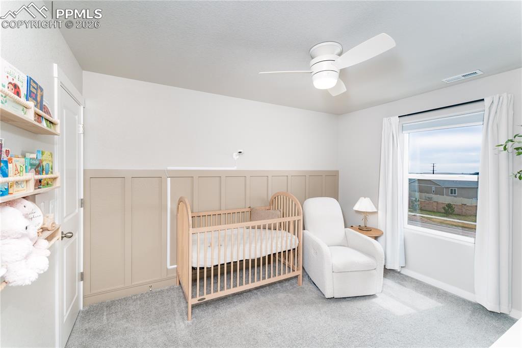 Image 19 of 38: upstairs bedroom 