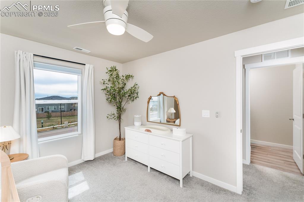 Image 20 of 38: upstairs bedroom 