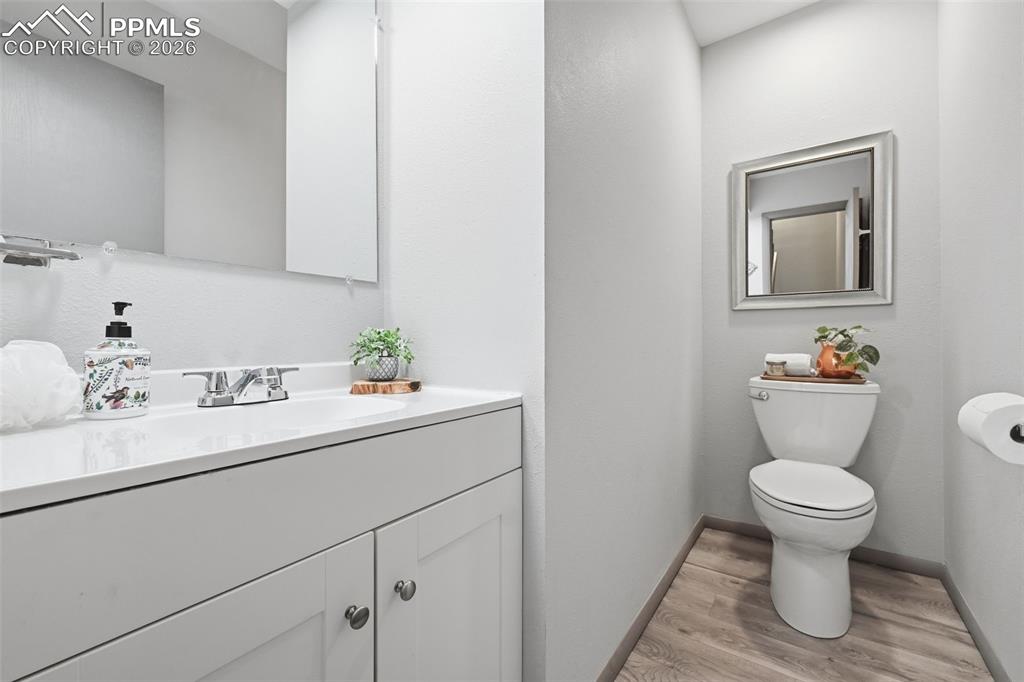 Image 13 of 26: 1/2 bathroom on main level
