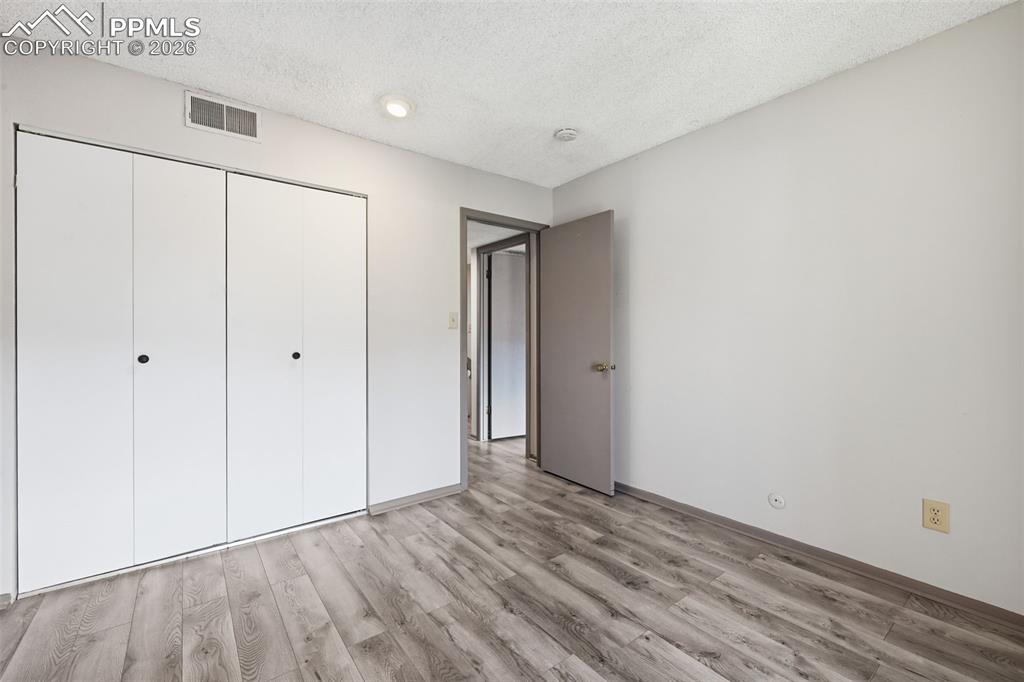 Image 17 of 26: Primary bedroom upper level