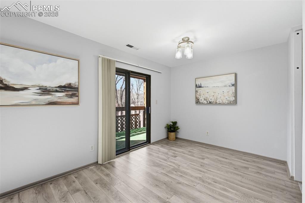 Image 7 of 26: Dining room with walk out.