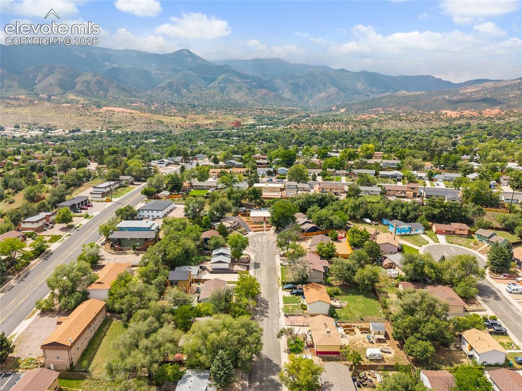 Image 49 of 49: Community setting with established residential properties and mature trees