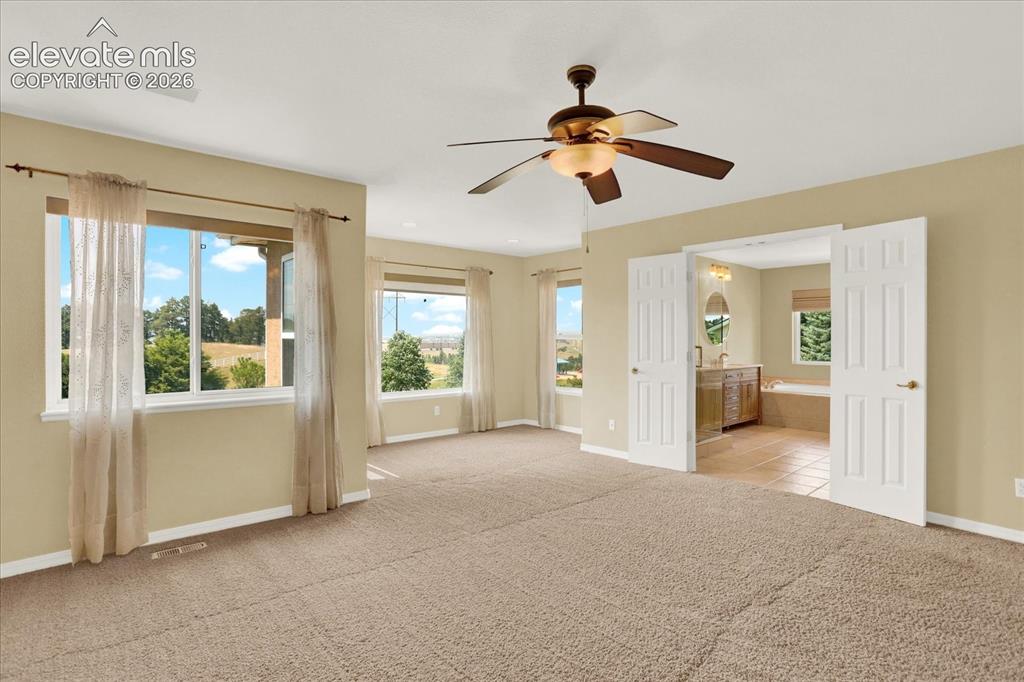Image 22 of 50: Master Bedroom