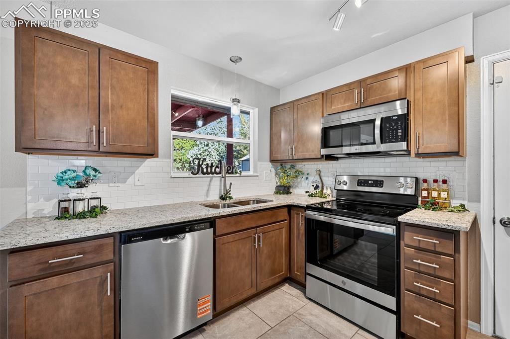Image 11 of 46: So many cabinets and lots of countertop space. Everything is new!
