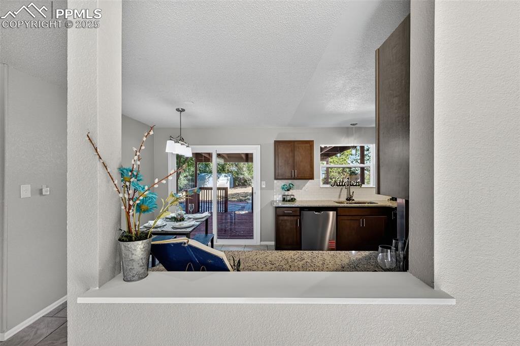 Image 14 of 46: A final view of the kitchen.