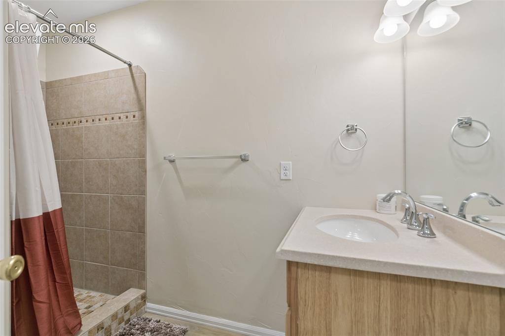 Image 23 of 34: Basement Bathroom