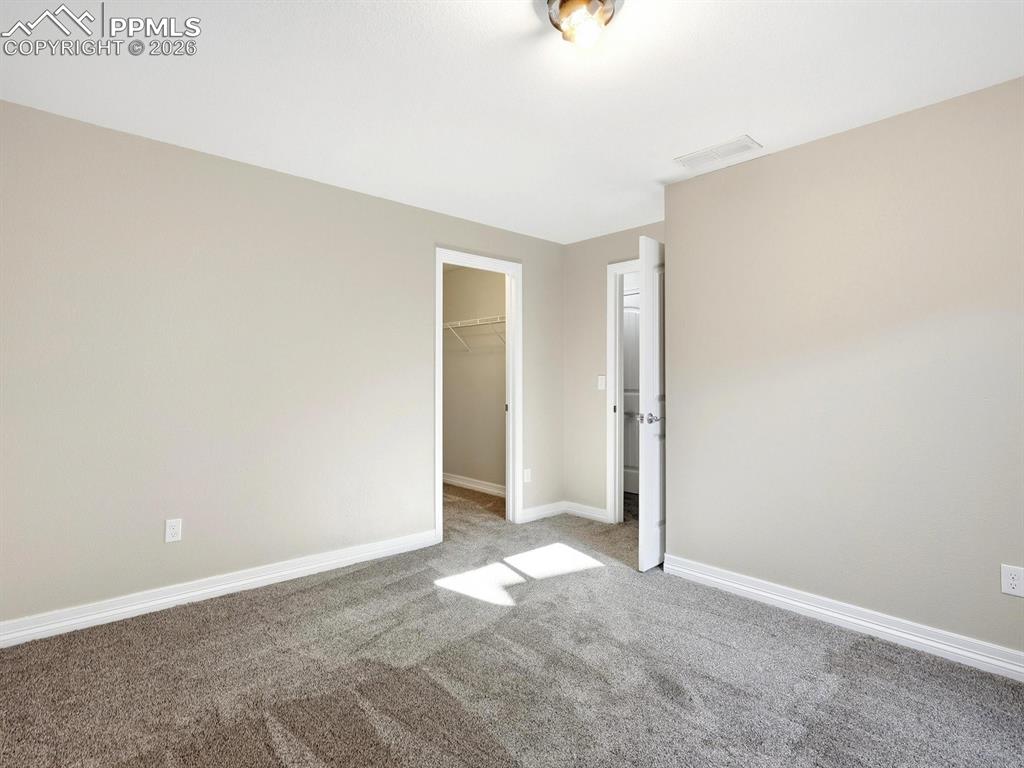 Image 41 of 49: Spacious bedrooms in basement