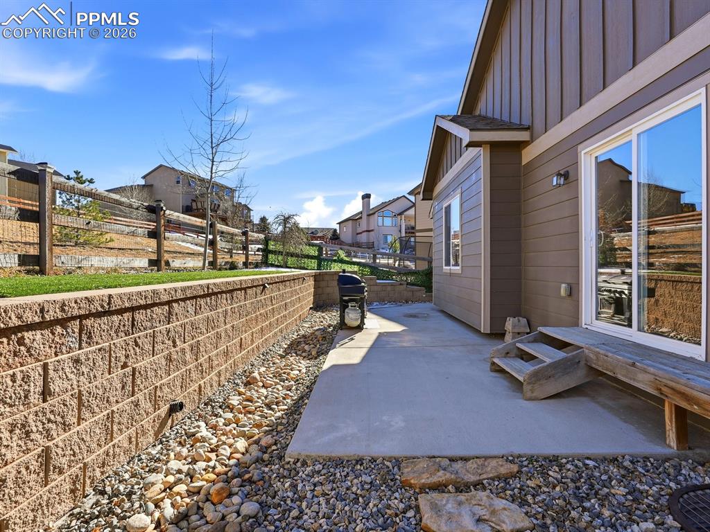Image 46 of 49: Large patio space perfect for entertaining