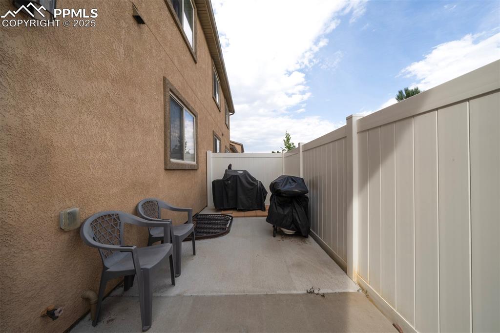 Image 28 of 34: View of patio / terrace with grilling area