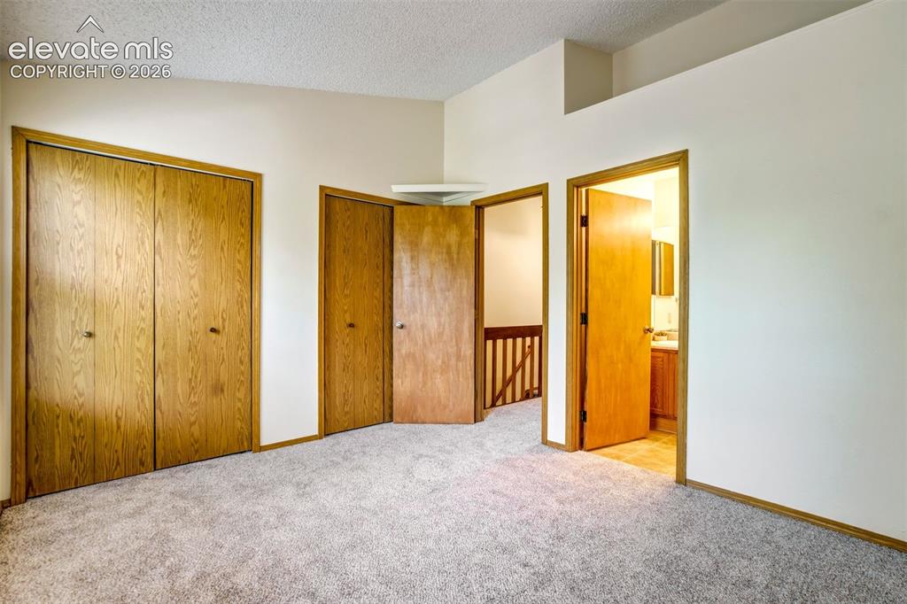 Image 30 of 44: Second bedroom with 2 closets