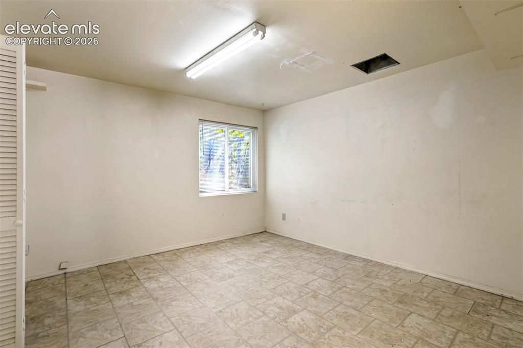 Image 38 of 44: StoStorage room- located off the garagerage room