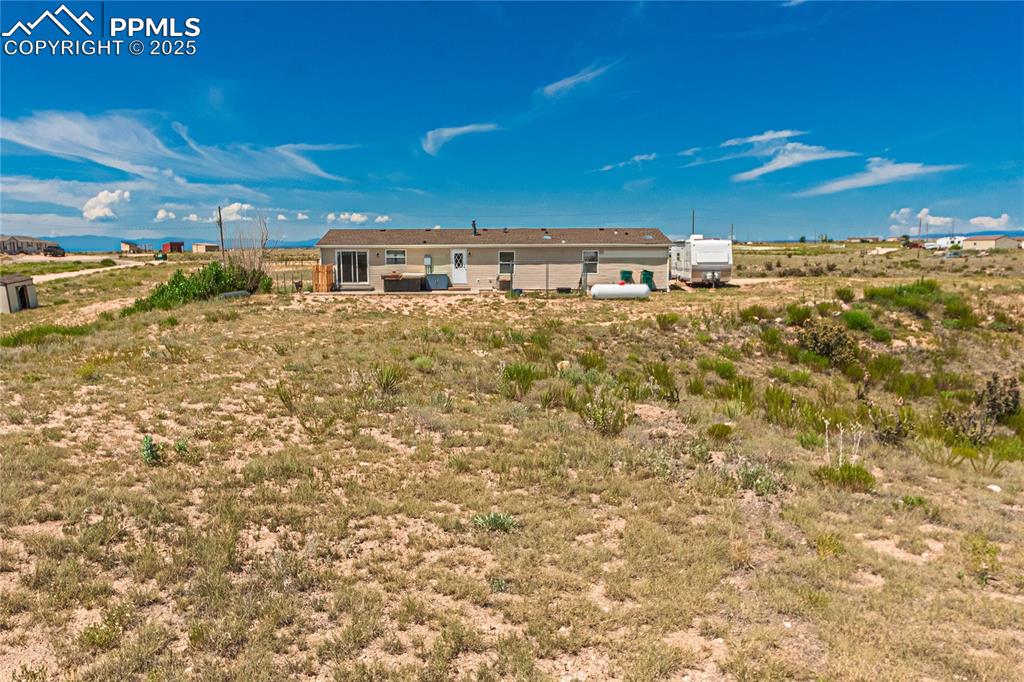 Image 36 of 48: Rear view of house