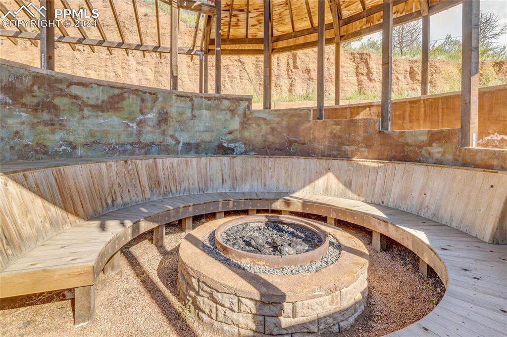 Image 33 of 47: View of terrace with a fire pit