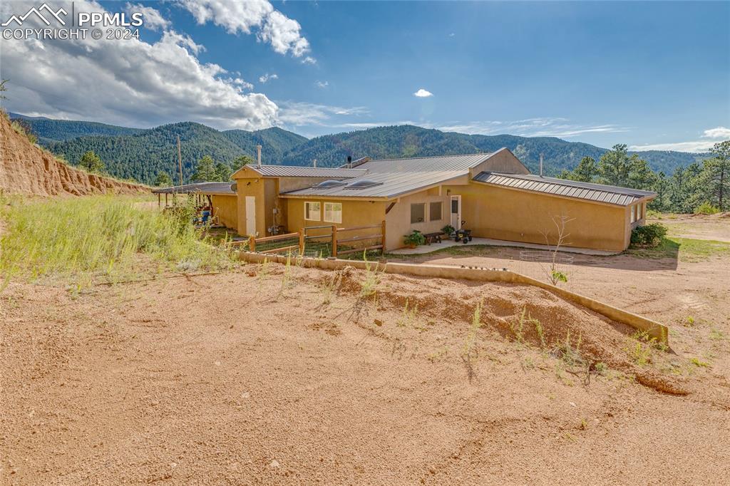 Image 43 of 47: View of front of home with a mountain view