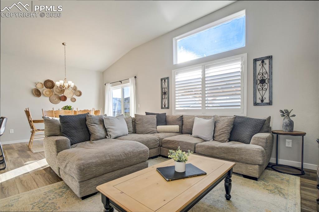 Image 12 of 47: A living room that feels like a breath of fresh air.