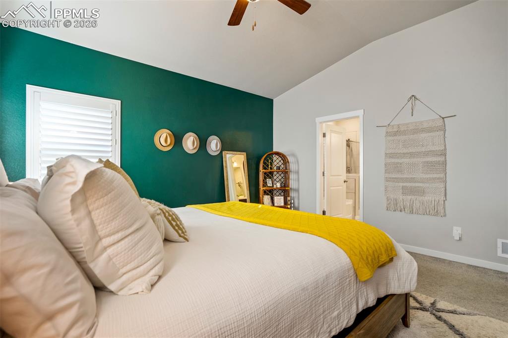 Image 18 of 47: Tall ceilings and an attached bathroom. 