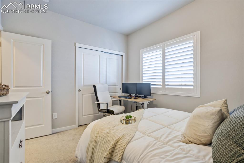 Image 28 of 47: Bedroom 3 currently being used as an office. 