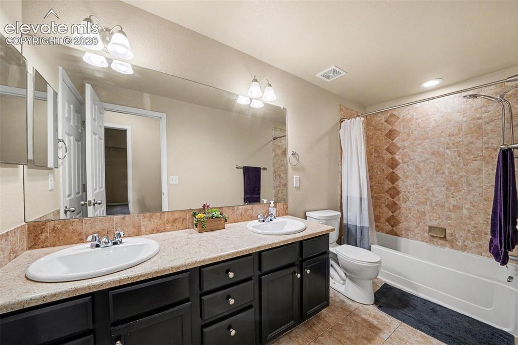 Image 14 of 21: Full bath located in the walkout basement