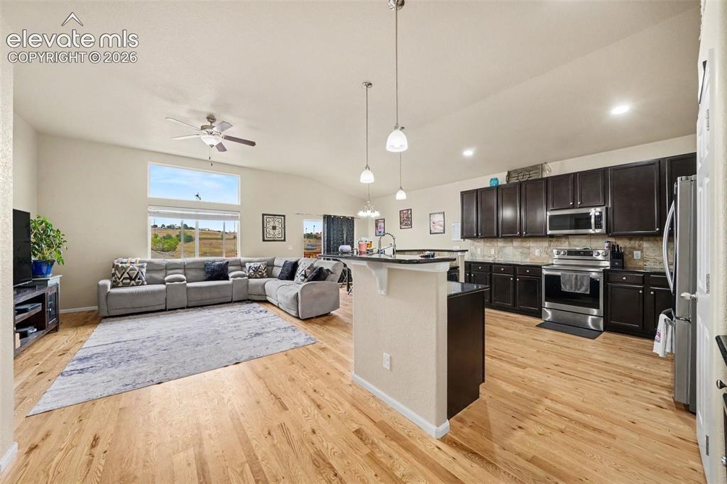 Image 5 of 21: kitchen and living room