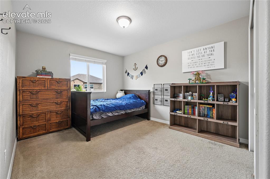 Image 34 of 48: Bedroom #3 of 5 is also a share-able size, and is right next to the loft up
