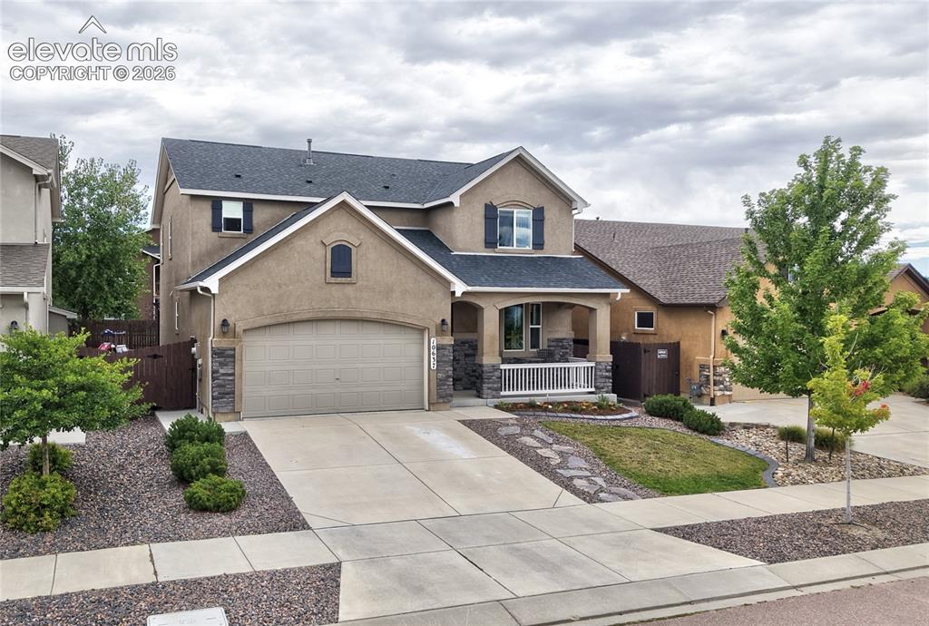 Image 5 of 48: The "Sierra" model by locally renowned Classic Homes is a lovely, inviting 