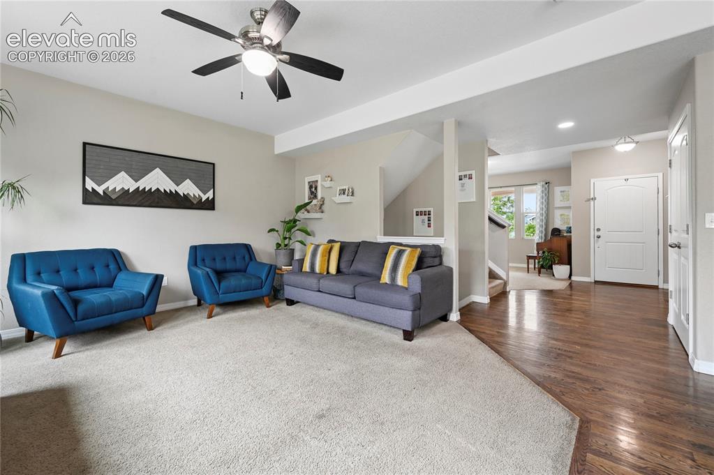 Image 9 of 48: The solid-oak hardwood floors were extended through the higher traffic area