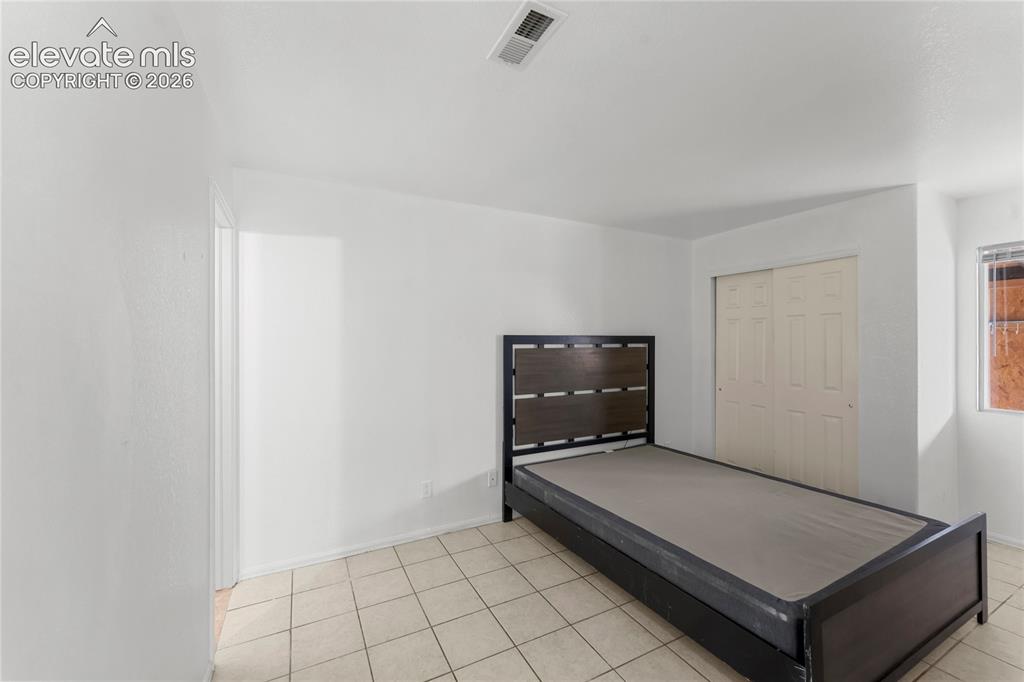 Image 13 of 26: Bedroom