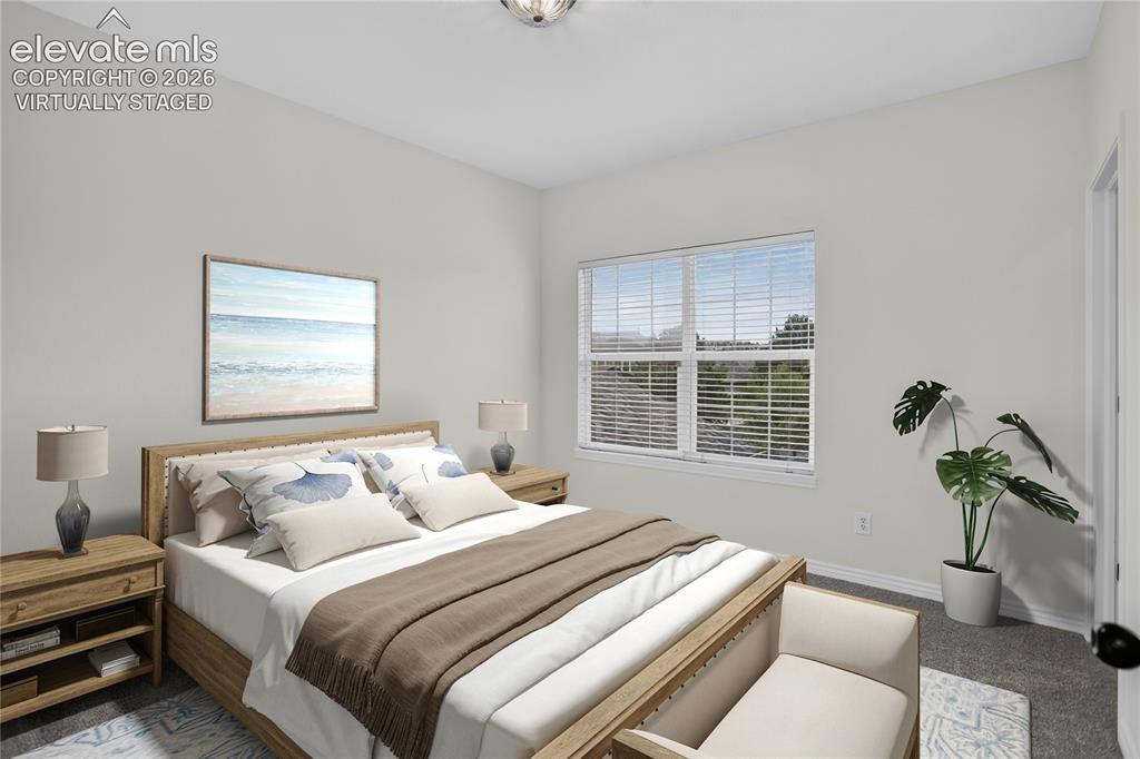 Image 10 of 32: Virtually staged primary bedroom