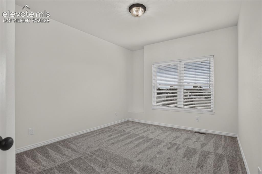 Image 13 of 32: 2nd Bedroom on upper floor