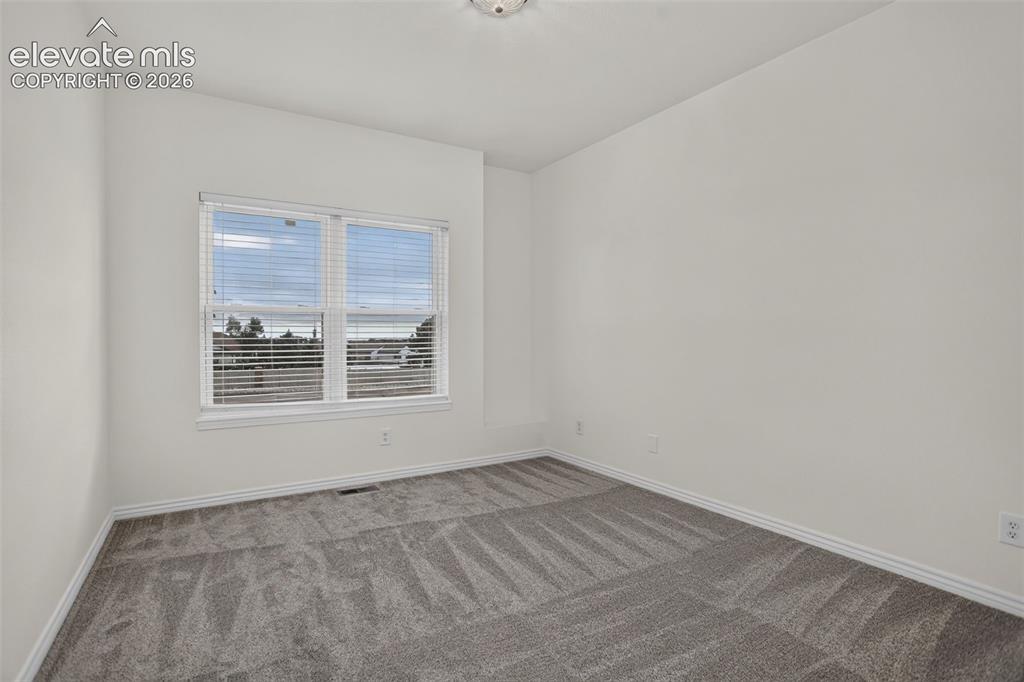 Image 14 of 32: 3rd bedroom on upper floor