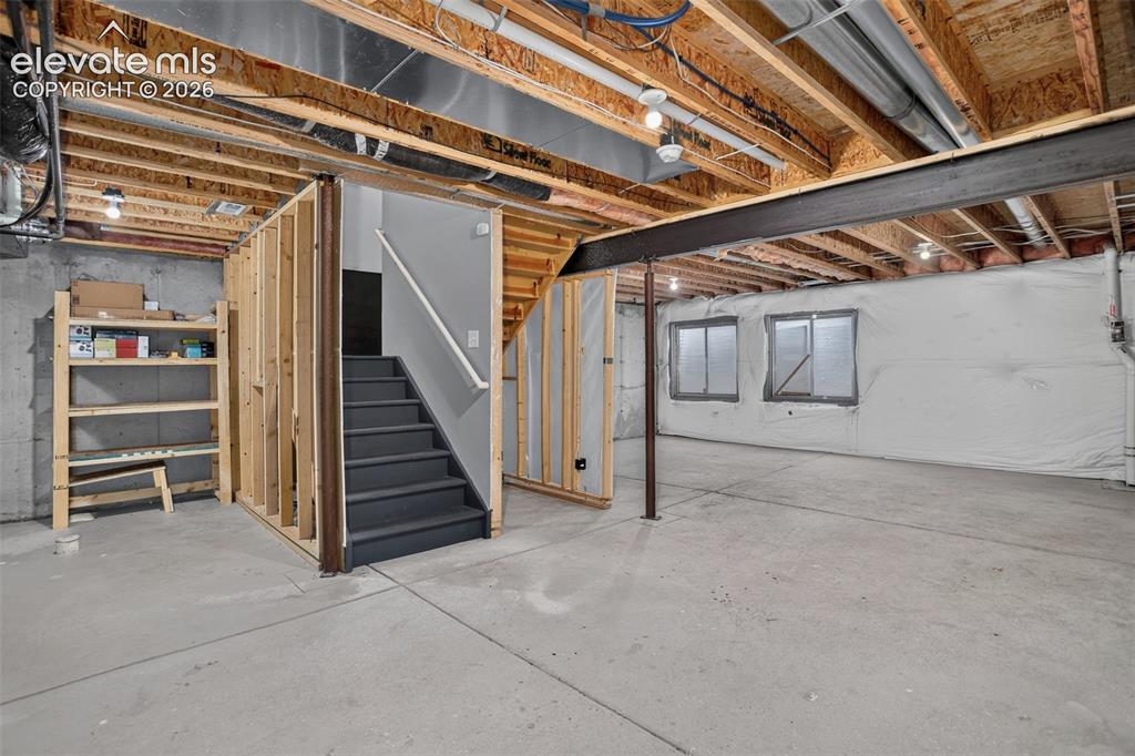 Image 17 of 32: Loads of storage and/or space for exercise or hobby room. Or add living spa