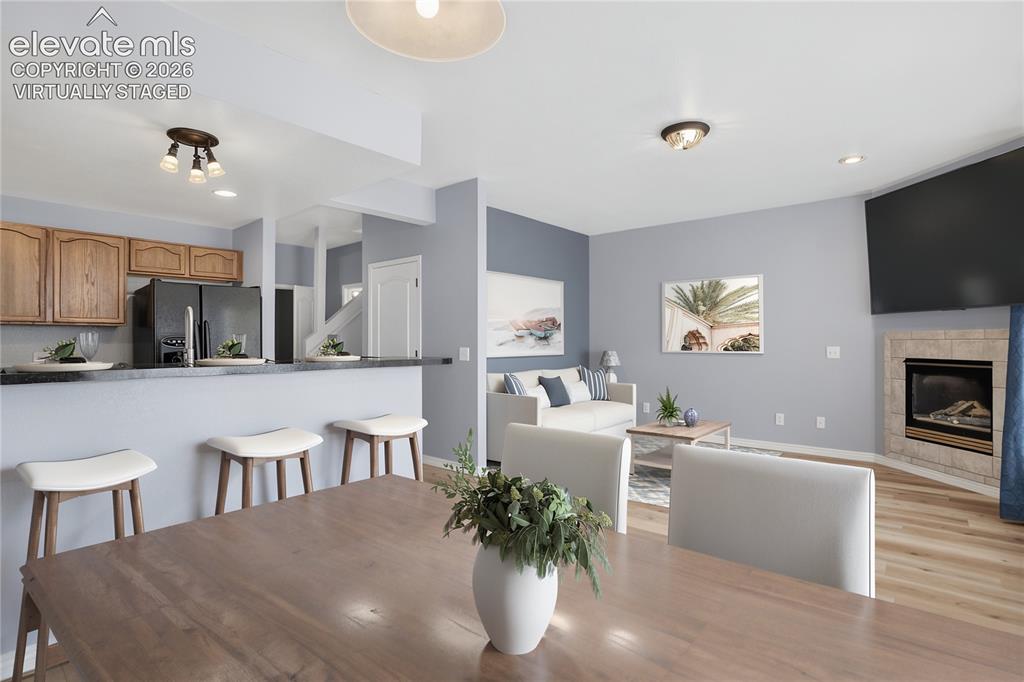 Image 5 of 32: Virtually staged dining area