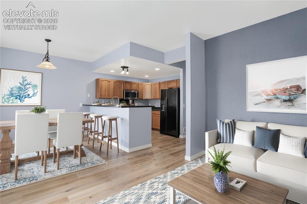 Image 6 of 32: Virtually staged main living area