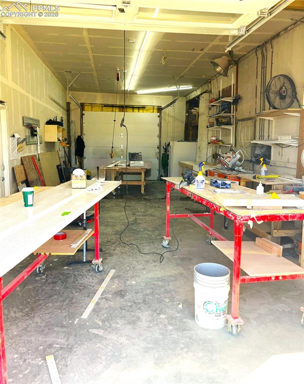 Image 7 of 10: Workshop with Overhead Door