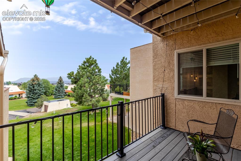 Image 19 of 49: Trex deck off of dining room