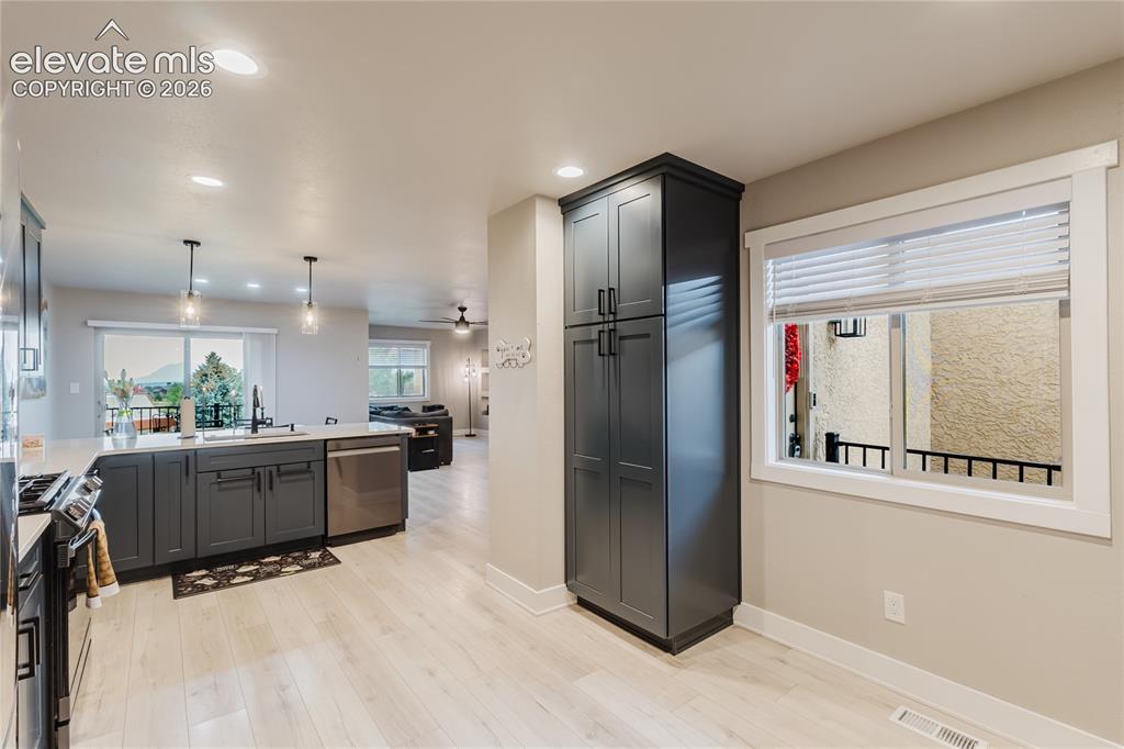 Image 9 of 49: Pull out drawers in cabinets
