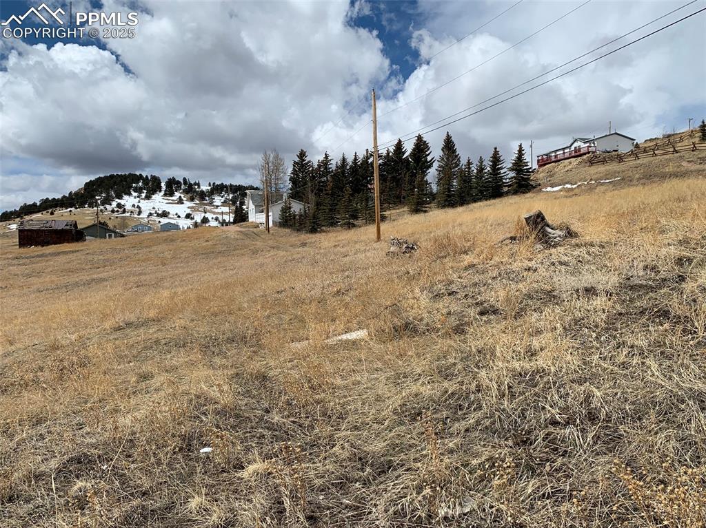 Image 13 of 22: View of yard featuring a view of rural / pastoral area