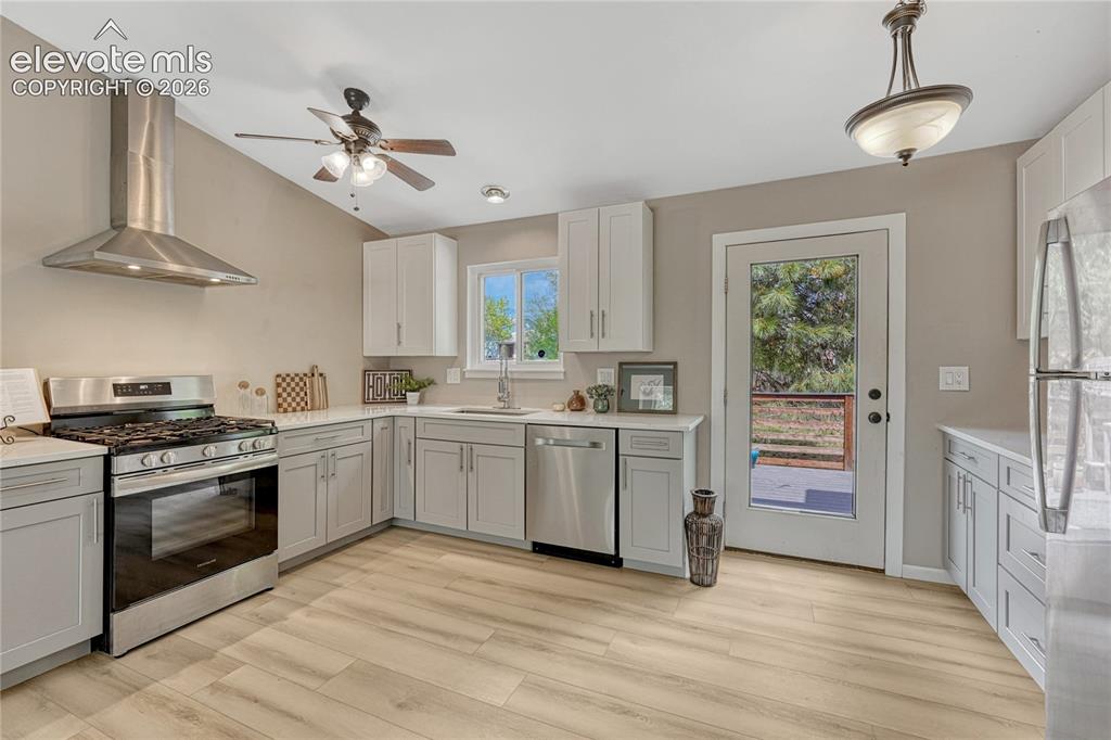 Image 12 of 33: Two toned cabinets.