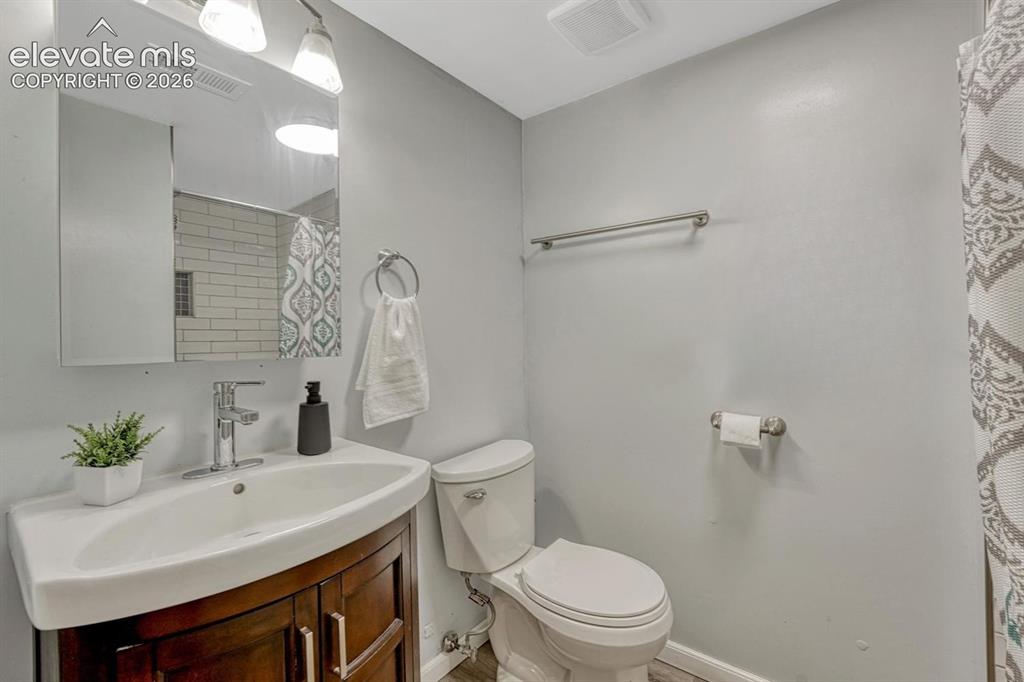 Image 28 of 33: 3/4th bathroom with NEW tile shower added in 2023. 