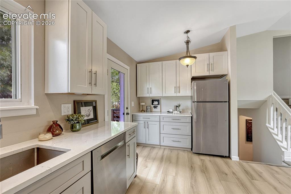 Image 6 of 33: Tons of cabinet and counter space. 