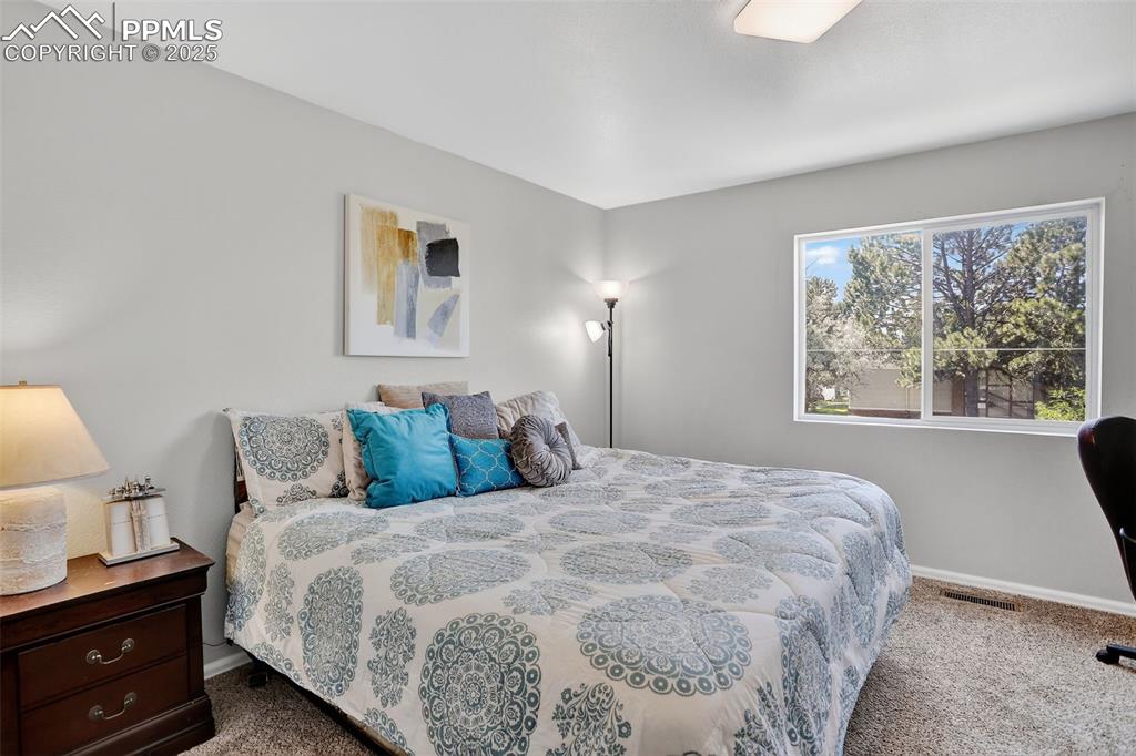 Image 14 of 26: secondary Bedroom - bright and loads of natural light
