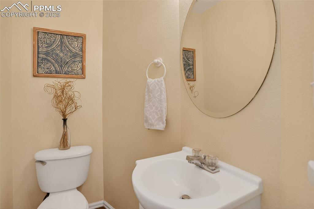 Image 7 of 26: Half bathroom on the main level - guest bathroom