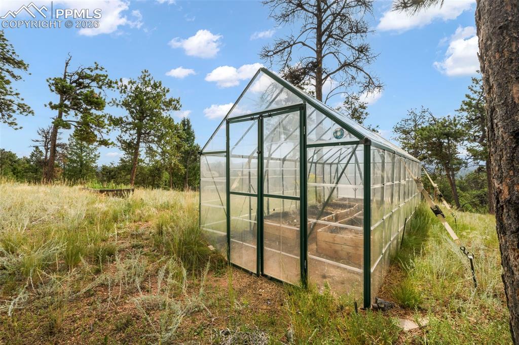 Image 42 of 50: View of greenhouse