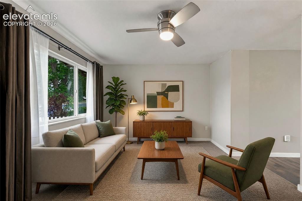 Image 5 of 34: Bright, spacious living room upon entrance, featuring neutral wall finishes