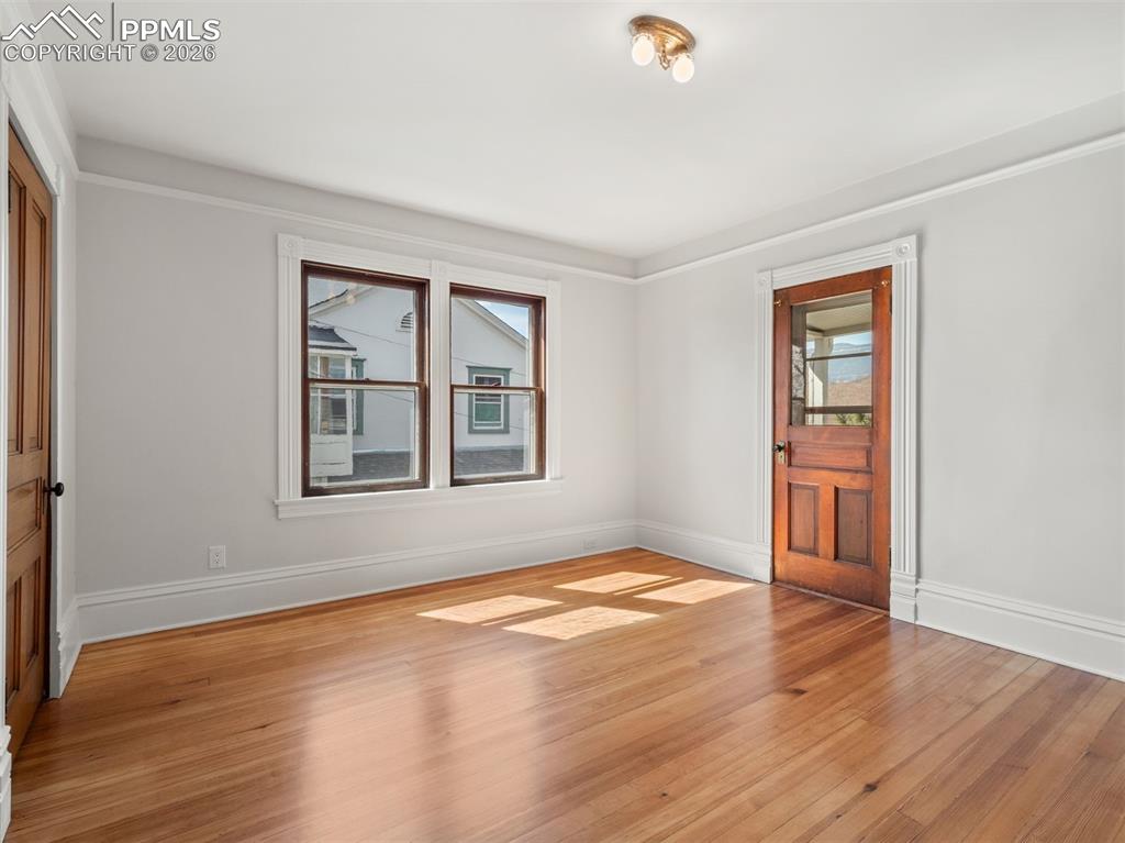 Image 16 of 41: Bedroom #3 of 3 bedrooms on the second floor with access to a covered balco